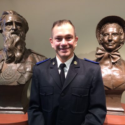 Dennis at Officer Training College with W and C booth